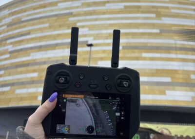 drone controller in front of the velodrome